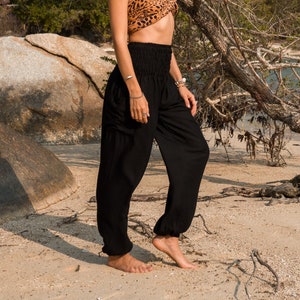 Sarouel uni noir femme pantalon hippie à entrejambe élevé vêtements de détente confortables pantalons de yoga ample festival d'été bohème plage