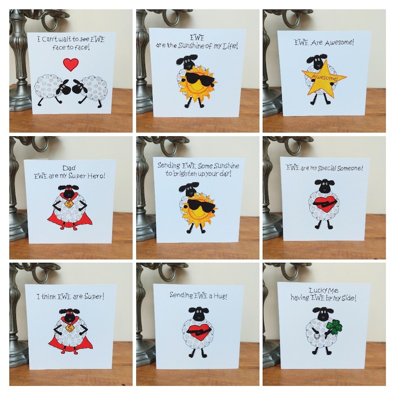 May include: Nine greeting cards featuring a cartoon sheep with different sayings. The sayings include "I Can't wait to see EWE face to face!" "EWE are the Sunshine of my Life!" "IWE Are Awesome!" "Dad EWE are my Super Hero!" "Sending EWE Some Sunshine to brighten up your day!" "EWE are my Special Someone!" "I think EWE are Super!" "Sending EWE a Hug!" "Lucky Me having EWE by my side!"