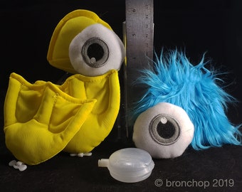 Muppet puppet halloween costume or toy making plush eyes beak and blue fur hair