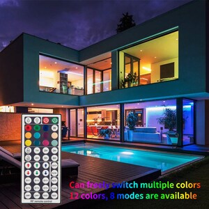 May include: A remote control with a variety of buttons, including color options, timer settings, and brightness adjustments. The text on the remote reads "Can freely switch multiple colors 12 colors, 8 modes are available RF remote control".