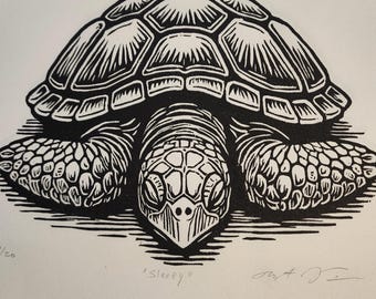 Woodcut Block Print by Robert Viana of a sleepy sea turtle