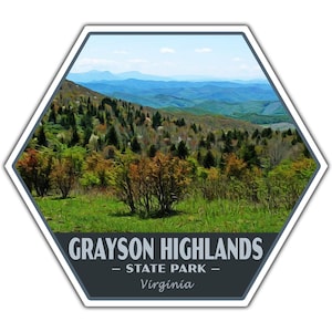 May include: A sticker depicting a mountain landscape from Grayson Highlands State Park, Virginia. The image shows green trees, grassy areas, and blue mountains under a blue sky. The text "Grayson Highlands - State Park - Virginia" is displayed.