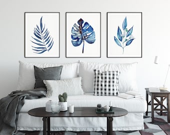 Conjunto de impresiones de hojas tropicales azules: arte mural botánico en acuarela