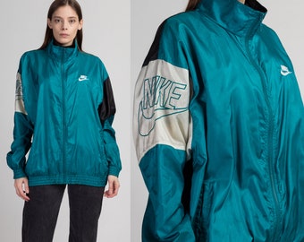 teal windbreaker nike