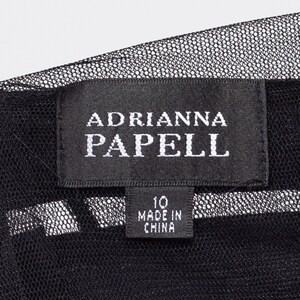 May include: Black and white label with the text "Adrianna Papell" and "10 Made in China".