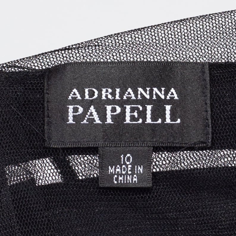 May include: Black and white label with the text "Adrianna Papell" and "10 Made in China".