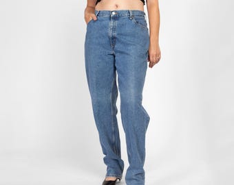 Jean mom taille haute Levis 550 des années 90 - grand, 33" taille (fr) jean Levi's vintage fuselé en denim délavé moyen