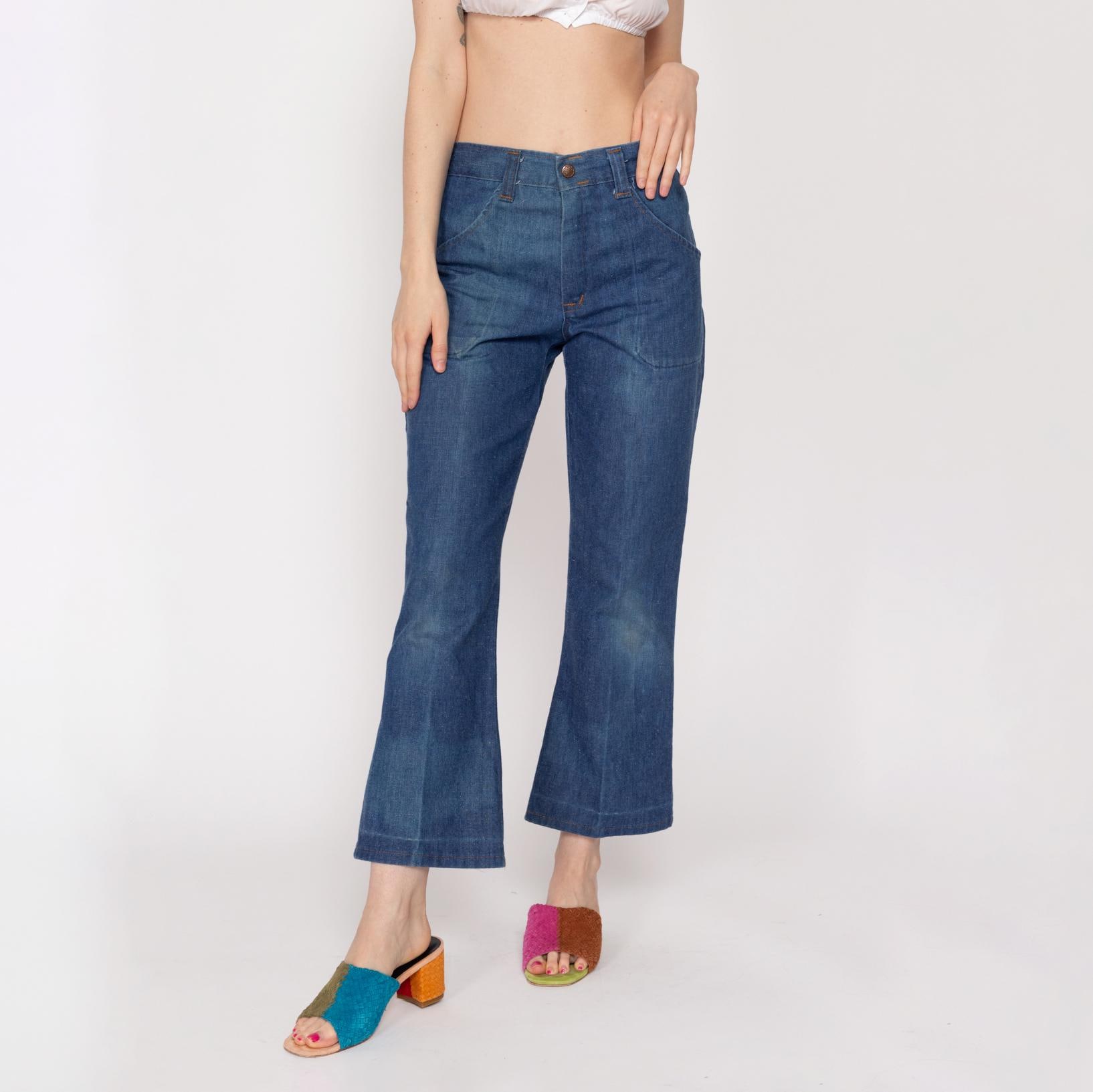 Pantalones campana desteñidos new arrivals