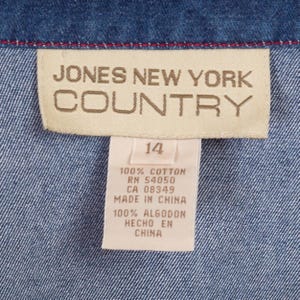 May include: A tan label with the text "JONES NEW YORK COUNTRY" in brown lettering. Below the label is a smaller white label with the text "14" in black lettering. The smaller label also has the text "100% COTTON RN 54050 CA 08349 MADE IN CHINA 100% ALGODON HECHO EN CHINA" in black lettering.