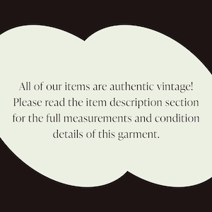May include: Text on a cream-colored cloud-shaped background against a dark brown backdrop. The text reads: "All of our items are authentic vintage! Please read the item description section for the full measurements and condition details of this garment."