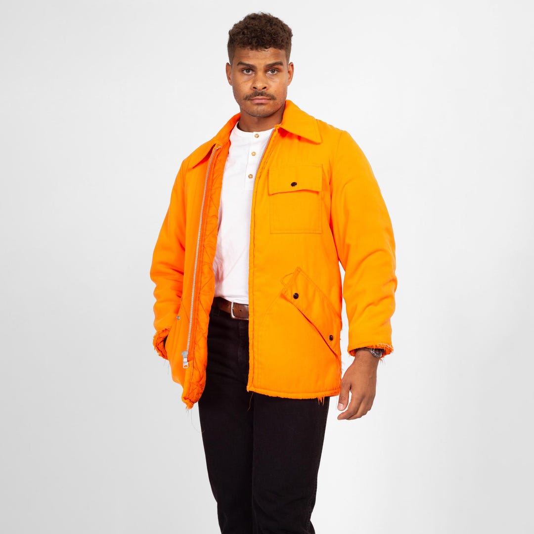 Chaqueta de caza con forro acolchado de color naranja neón de los