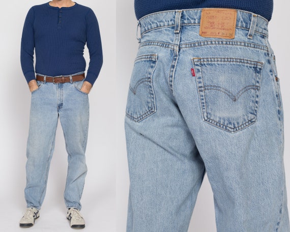 34x30 Vintage Levis 560 Made in USA Faded Light Wash Jeans