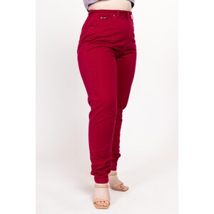May include: High-waisted red jeans with a slim fit.