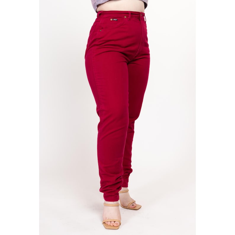 May include: High-waisted red jeans with a slim fit.