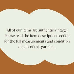 May include: Text on a light beige background within a brown oval shape. The text reads: "All of our items are authentic vintage! Please read the item description section for the full measurements and condition details of this garment."