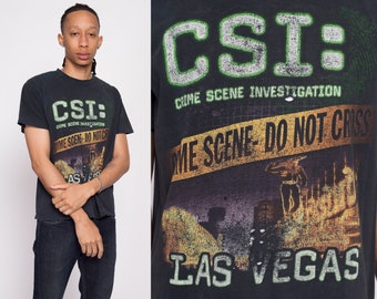 vintage T-shirt promotionnel des CSI Las Vegas pour hommes, taille moyenne | T-shirt noir délavé de la série TV Y2K