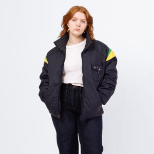 Vintage 70-80-tals Roffe dunfjäderpuffer skidjacka - Stor | Marinblå vinterkappa med sliten färg och puffig design