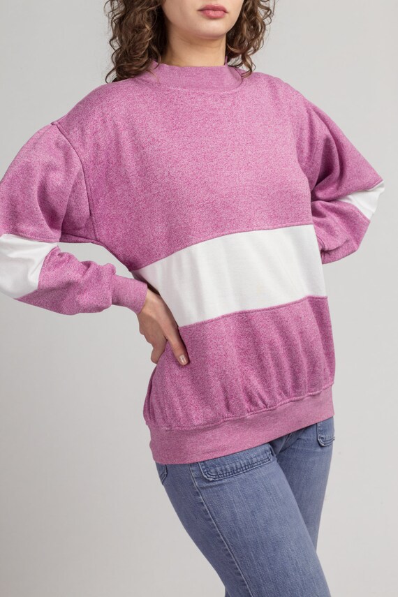 pink and white striped sweatshirt