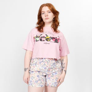 Groot jaren 90 Kliban Cat Fitness Center cropped T-shirt | Vintage roze Crazy Shirts Cartoon Animal T-shirt met grafische crop top op voor- en achterkant