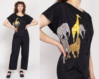 Medium 80s African Animal Applique Jumpsuit | Vintage Black Button Up Short Sleeve Tapered Leg Pantsuit