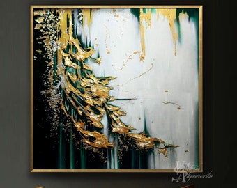 May include: Abstract painting with gold and green accents in a gold frame, hanging above two gold metal chairs with a unique design.