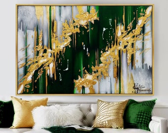 May include: Abstract painting with gold and green accents. The painting features a mix of white, gold, and green paint, creating a dynamic and textured effect. The gold accents are particularly striking, adding a touch of luxury to the piece.