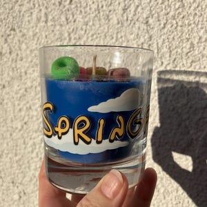 Simpsons Doh Doughnut scented fun candle, blue coconut wax and vegan fragrance oil, pink and yellow mini wax donuts