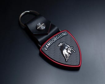 Brelok z włókna węglowego Anodowane aluminium, napisy i byk z tytanu, Urus, Aventador, Huracan, Murcielago, Lamborghini