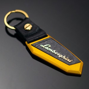 Lamborghini keychain, Anodized aluminum, carbon fiber, bronze lettering, Leather, Urus, Aventador, Huracan, murcielago, Gallardo, Countach