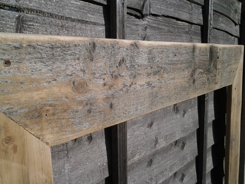 May include: A rustic wooden frame with a natural wood finish. The frame is made of reclaimed wood and has a distressed look. The frame is perfect for adding a touch of rustic charm to any room.