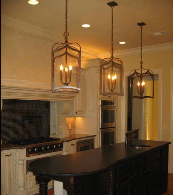 A fantastic black gothic kitchen with modern cabinets, refined
