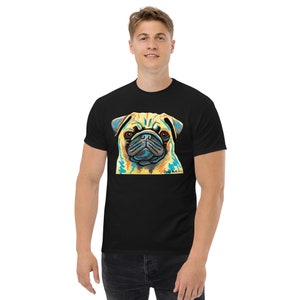 May include: A black t-shirt with a colorful illustration of a pug's face. The text "Dog Artistry" is printed below the image.