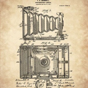 May include: A black and white line drawing of a photographic camera patent from 1902. The patent is for a folding camera with a bellows system. The drawing shows the camera in both its folded and extended positions. The patent number is 691,592 and the inventor is F. A. Brownell.