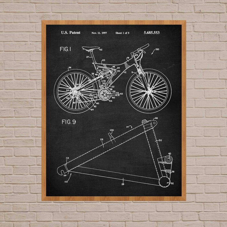 May include: Black and white line drawing of a bicycle patent, showing the design of a mountain bike. The patent number is 5,685,553 and the date is Nov. 11, 1997. The drawing shows the bike's frame, wheels, and suspension system.