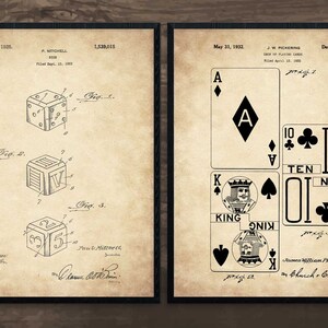 May include: Two vintage patent drawings. The left drawing shows a design for a toy block with the letter V on one side. The right drawing shows a design for a deck of playing cards with the Ace of Spades and the Ten of Clubs.