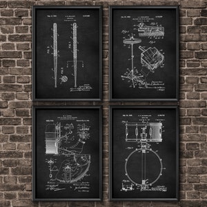 May include: A set of four black and white vintage patent drawings for a drum set. The drawings show the different parts of the drum set, including the drums, cymbals, and stand. The drawings are in a minimalist style and are perfect for a drummer's home office or studio.
