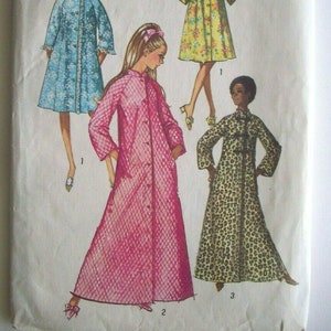 May include: Vintage Simplicity sewing pattern 9074 featuring four different robe designs. The pattern includes a size 12 with a 34-inch bust. The robes are shown in various fabrics, including floral, quilted, and animal print.