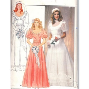 May include: A vintage sewing pattern featuring illustrations of three different wedding dresses. One dress is white with a ruffled neckline, another is a coral-colored gown with puff sleeves, and the third is a white dress with a high neckline and short sleeves.