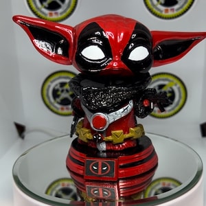 The child/Deadpool Custom Funko pop!