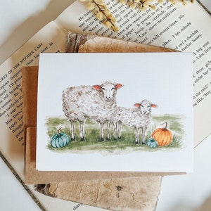 Carte de vœux moutons avec citrouilles, carte de vœux d’automne, peinture de moutons, aquarelle de mouton, animaux de ferme, carte de vœux