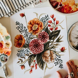 May include: Watercolour painting of a floral bouquet featuring red, orange and pink flowers. The flowers are surrounded by green leaves and stems. The painting is on a white background.