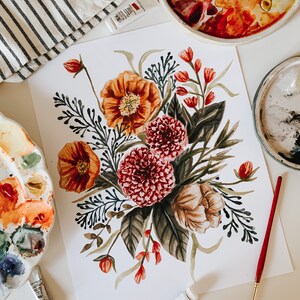 May include: A watercolour painting of a bouquet of flowers in shades of red, orange, and green. The flowers are arranged in a loose, natural style, and the painting is done on a white background.