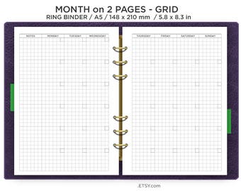 May include: A white monthly planner with a grid layout for a ring binder. The planner is divided into two pages, each with a column for each day of the week. The planner is labelled "MONTH on 2 PAGES - GRID" and "RING BINDER / A5 / 148 x 210 mm / 5.8 x 8.3 in".