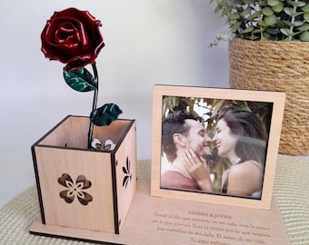 Wooden base with a picture frame and rose