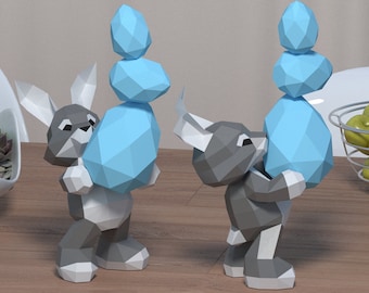 Modèle 3D de lapin de Pâques en papercraft, lapin de Pâques tenant des oeufs de Pâques sculpture low poly, projet cricut SVG, décoration en papier de Pâques