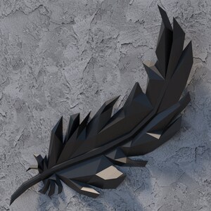 May include: A black geometric feather sculpture with a textured surface. The sculpture is made of many small triangles and is reminiscent of a bird's feather.