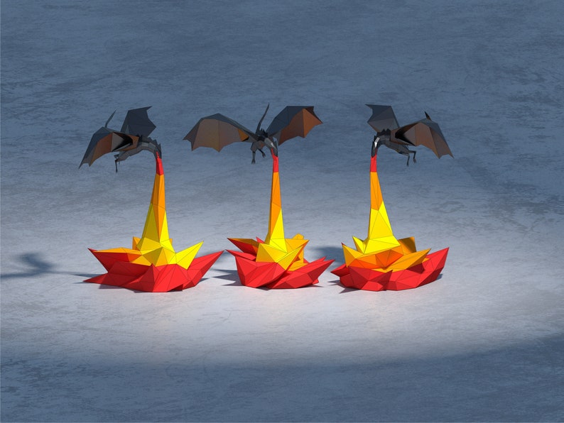 May include: Three origami dragons are shown in flight, each with black wings and a red, yellow, and orange flame emanating from their mouths.