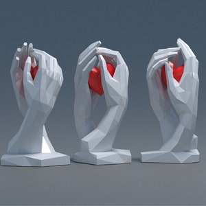 Modello PDF di cuore in carta 3D in mano per la festa della donna, scultura di carta, mani fai da te Low Poly con scultura a forma di cuore per la festa della donna