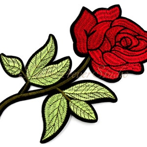 May include: Red embroidered rose with green leaves and a black stem. The rose is a single bloom with a layered design. The leaves are a light green with a dark green outline. The stem is black with a brown outline.