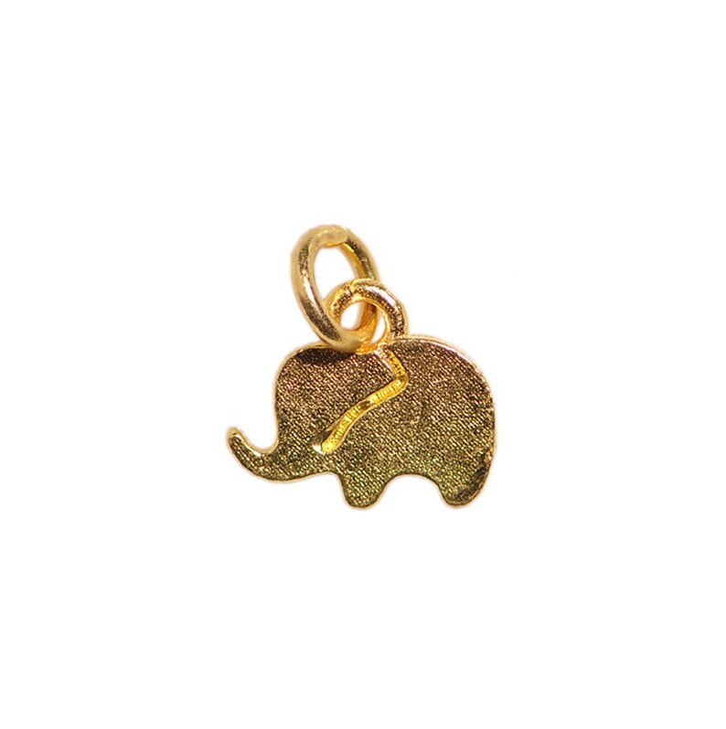 May include: A small, gold-colored elephant charm with a textured surface. The charm has a loop at the top for attaching to a necklace or bracelet. The elephant has a trunk, ears, and a tail. The charm is set against a white background.